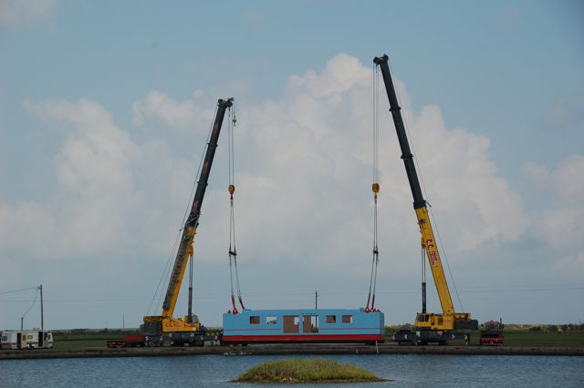 Original Harrisons Landing floating barge with cranes