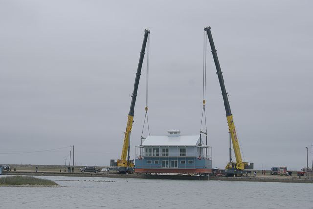 Original Harrisons Landing floating barge with cranes