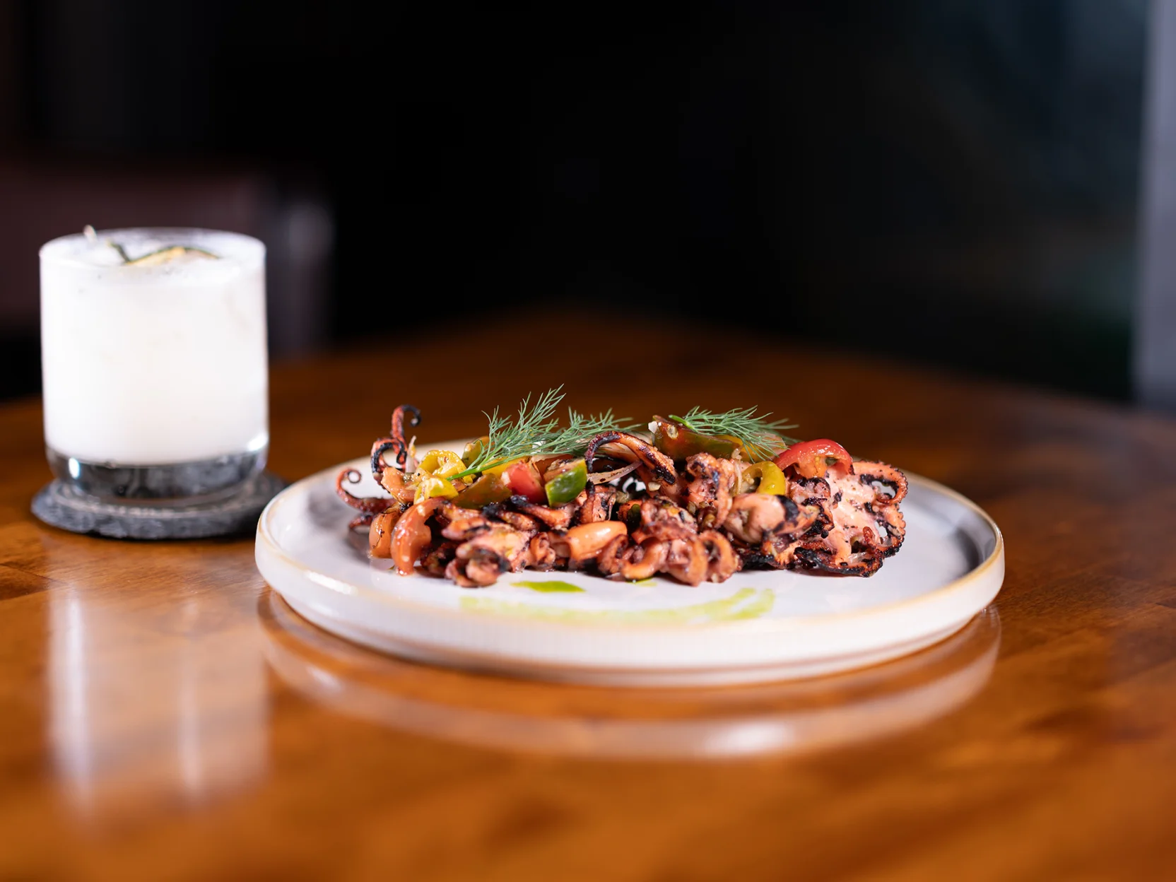 plate of tapas with a delicious drink on the side